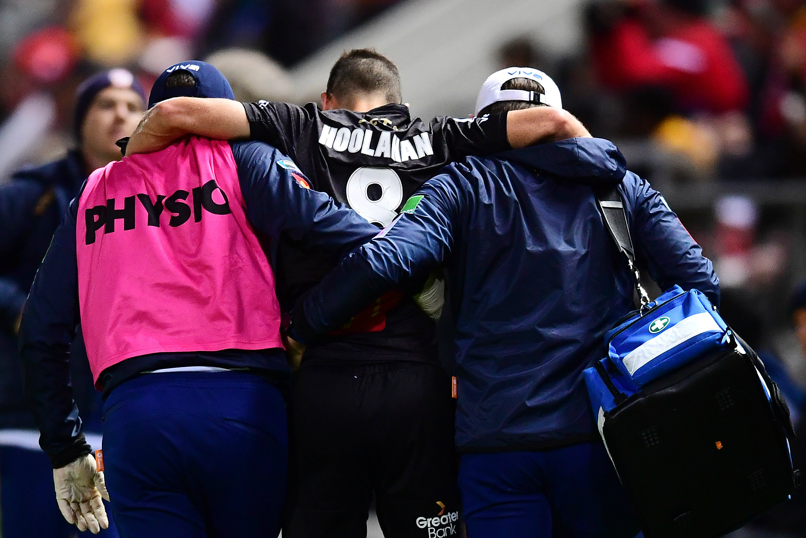 Wes Hoolahan is carried from the field at Coopers Stadium in the Jets' loss to Adelaide United
