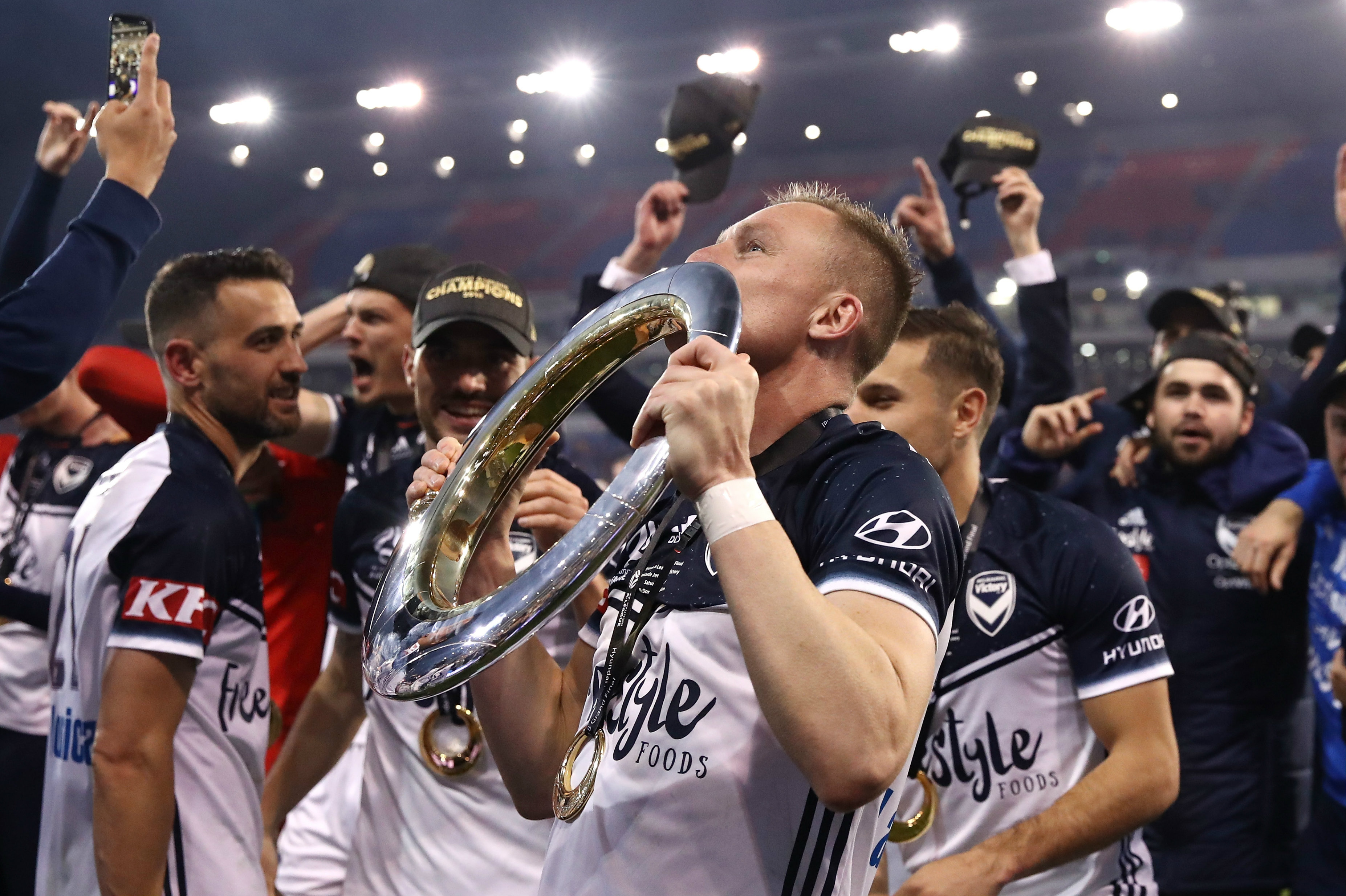 Besart Berisha celebrates his most recent Hyundai A-League title while at Victory