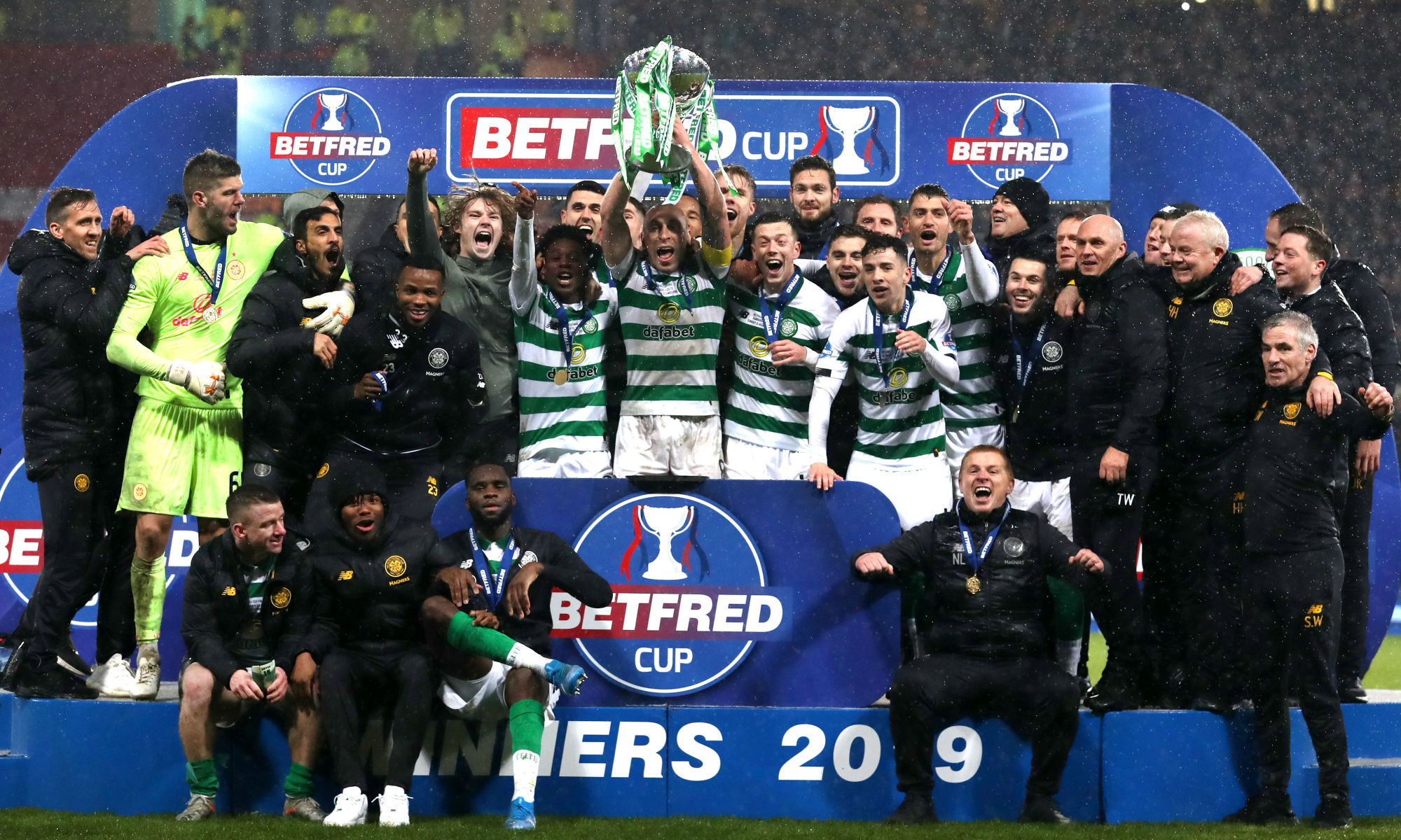 Rogic celebrates with Celtic's victorious League Cup winning squad