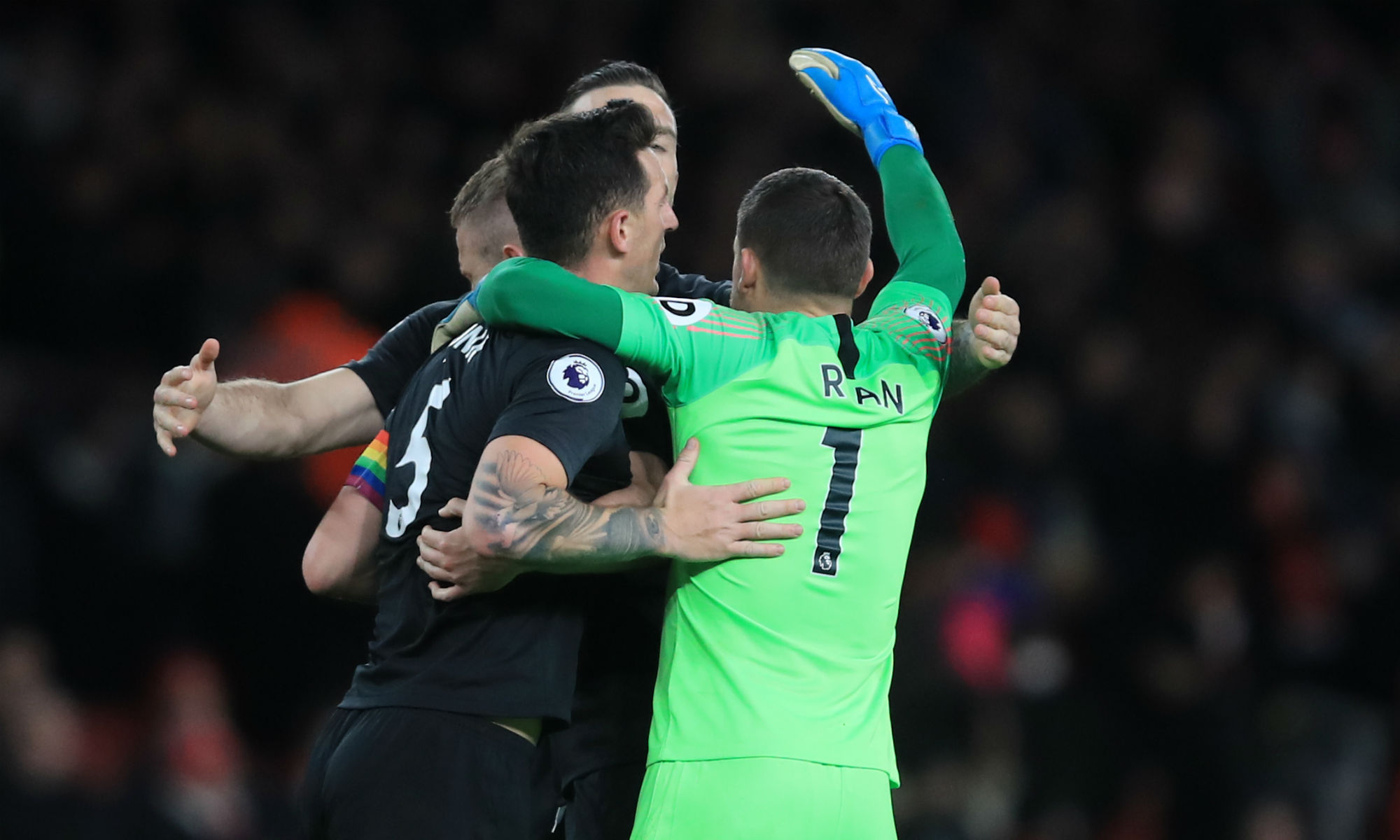 Mat Ryan celebrates with his teammates at the final whistle after Brighton beat Arsenal 2-1 at the Emirates Stadium.