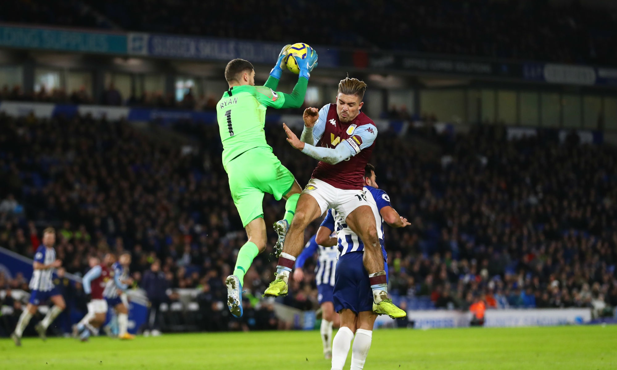 Socceroos number one Ryan claims a high cross under pressure from Jack Grealish.