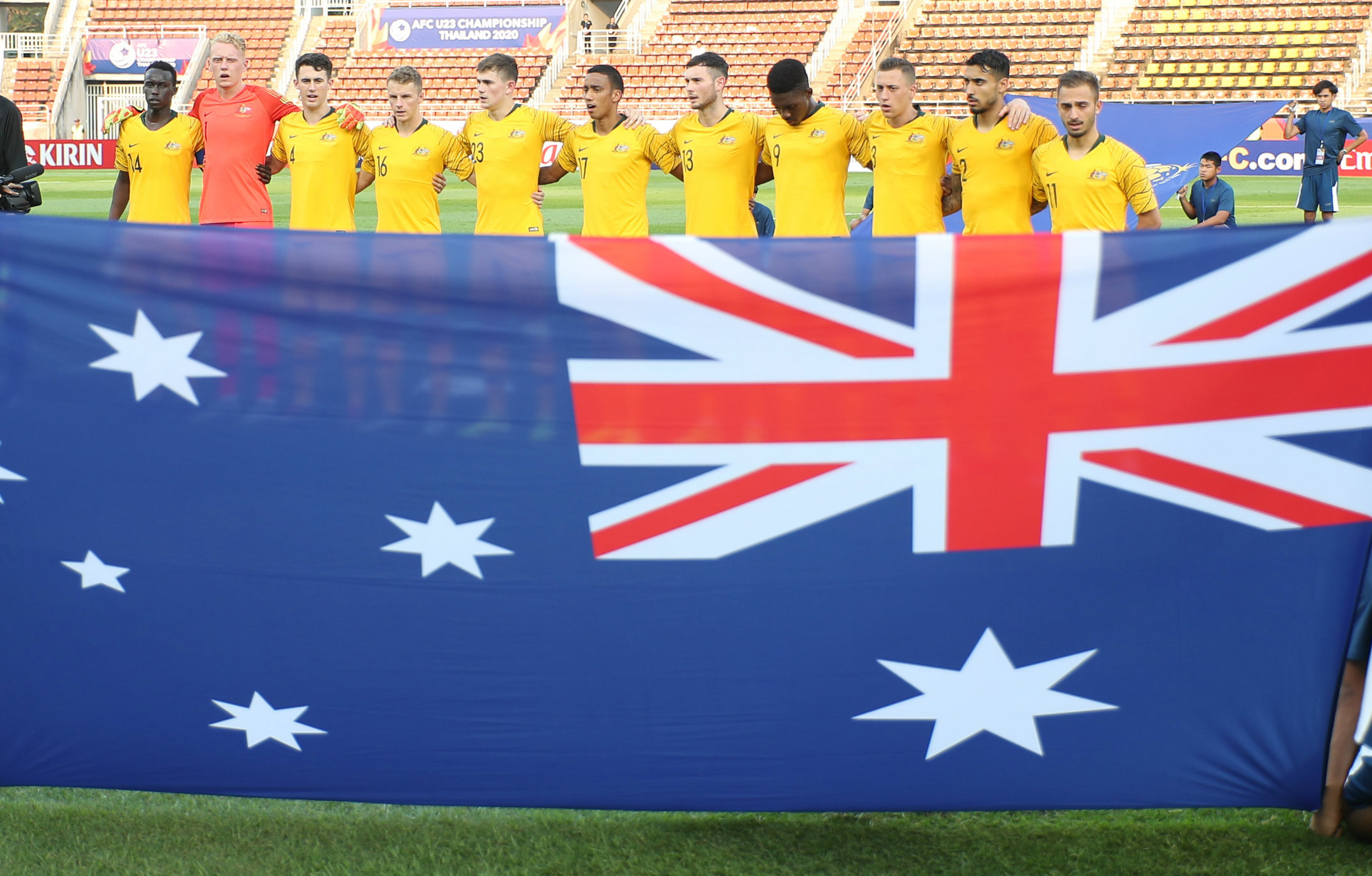 Australia's starting XI sing the anthem ahead of the Iraq clash