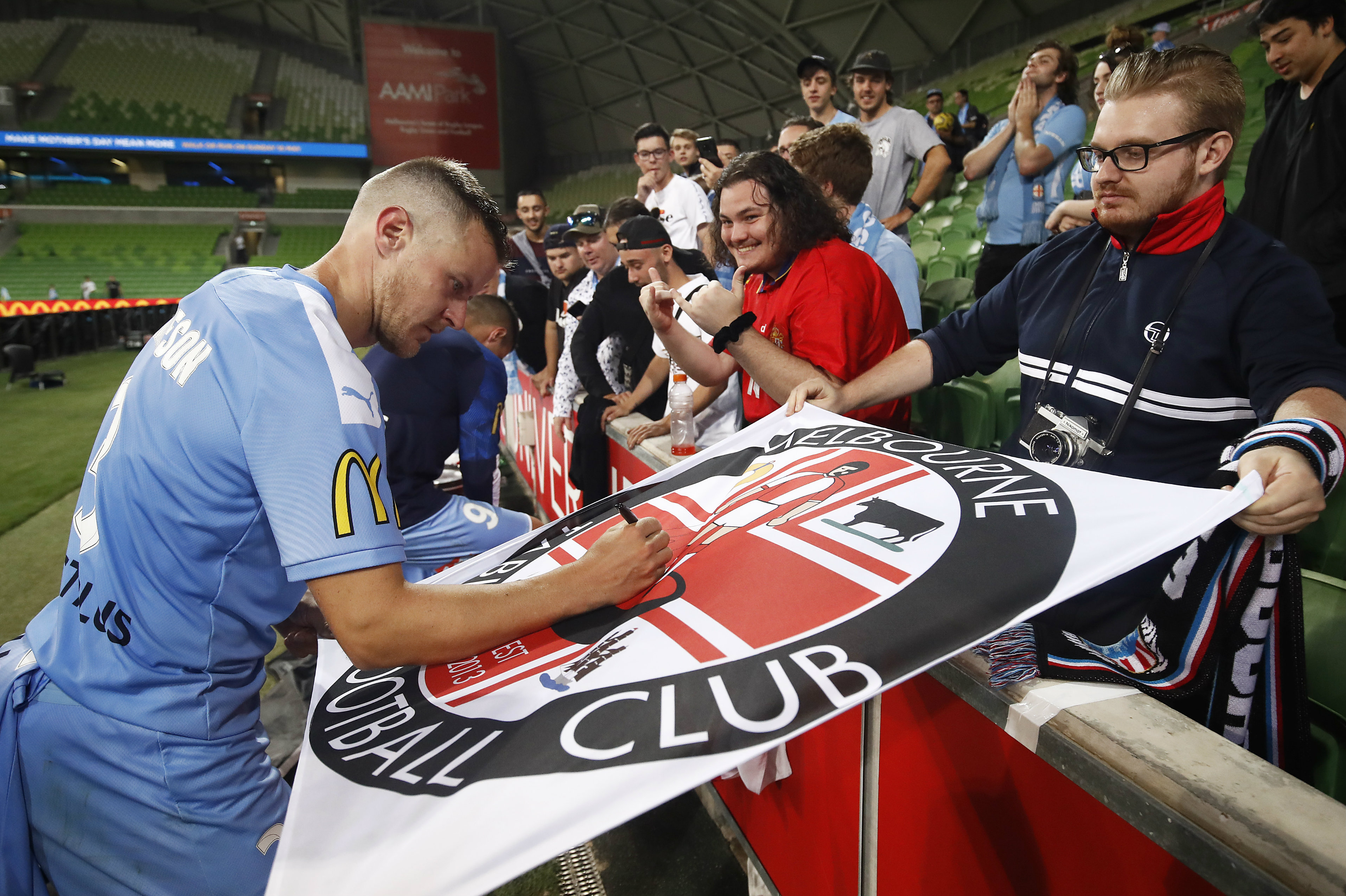 Scott Jamieson with the City fans after his 250th game