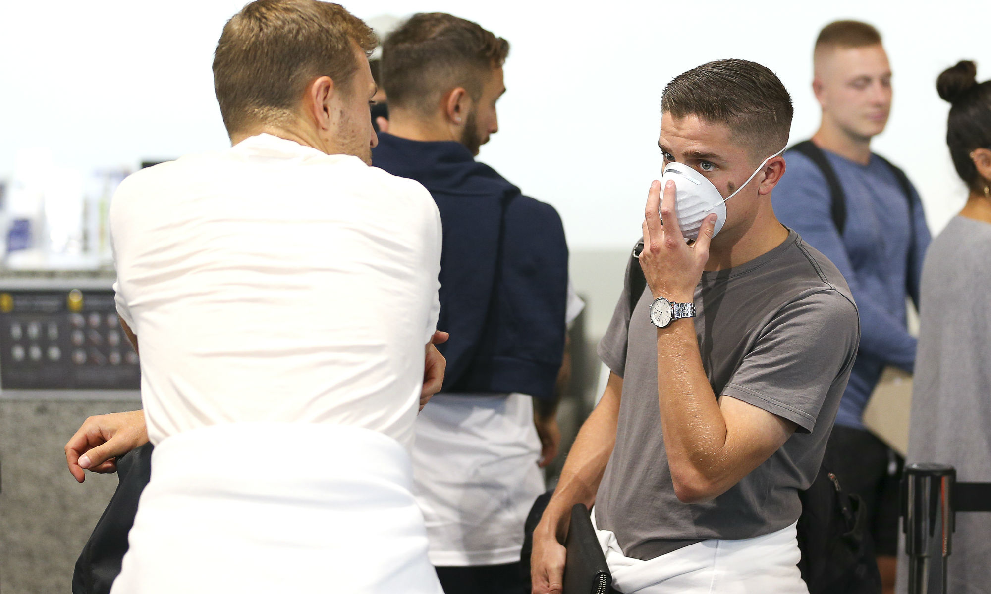 Phoenix players gather at Wellington airport on Wednesday, ahead of their flight to Sydney.