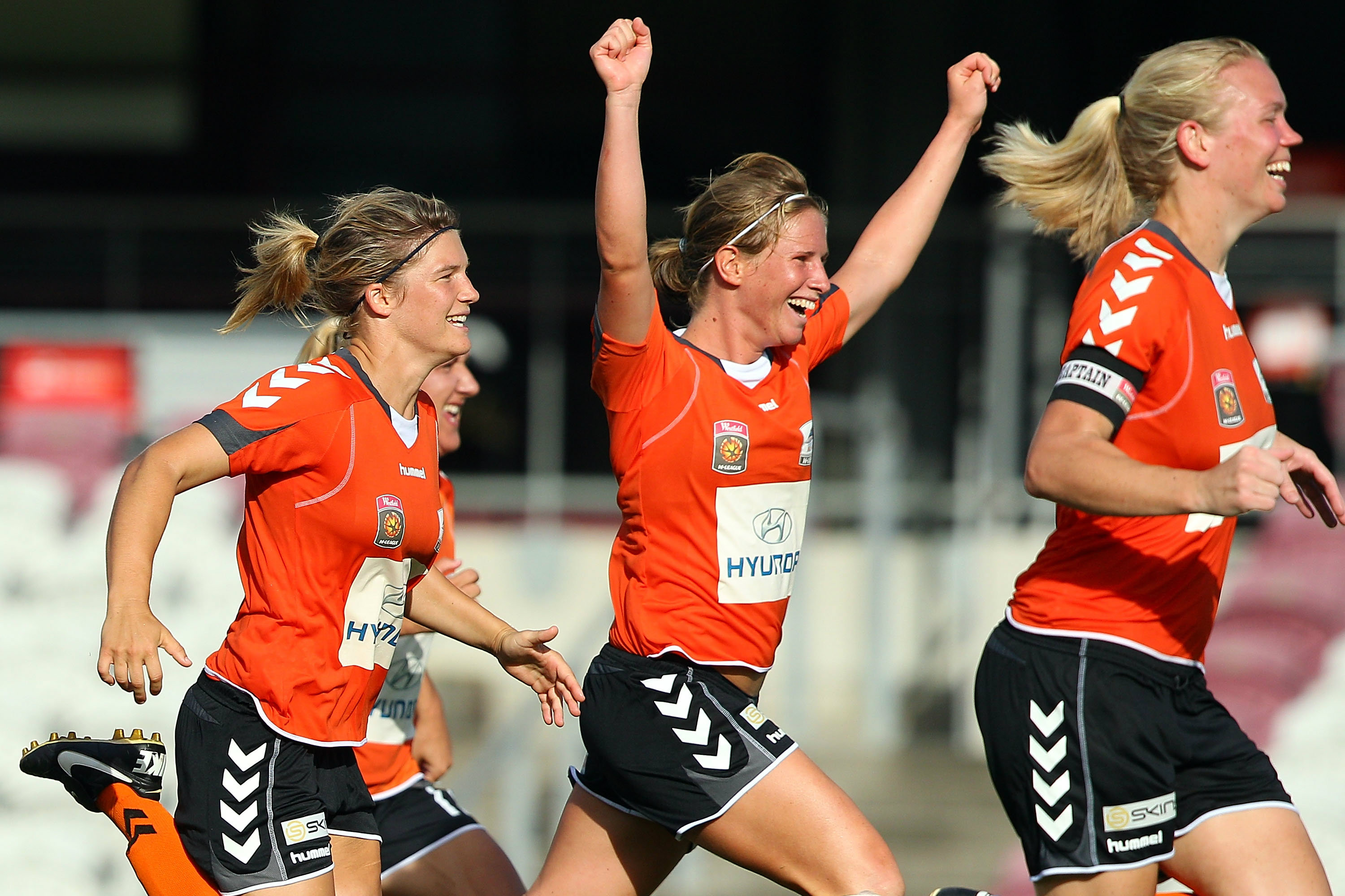 Roar players celebrate their shootout win