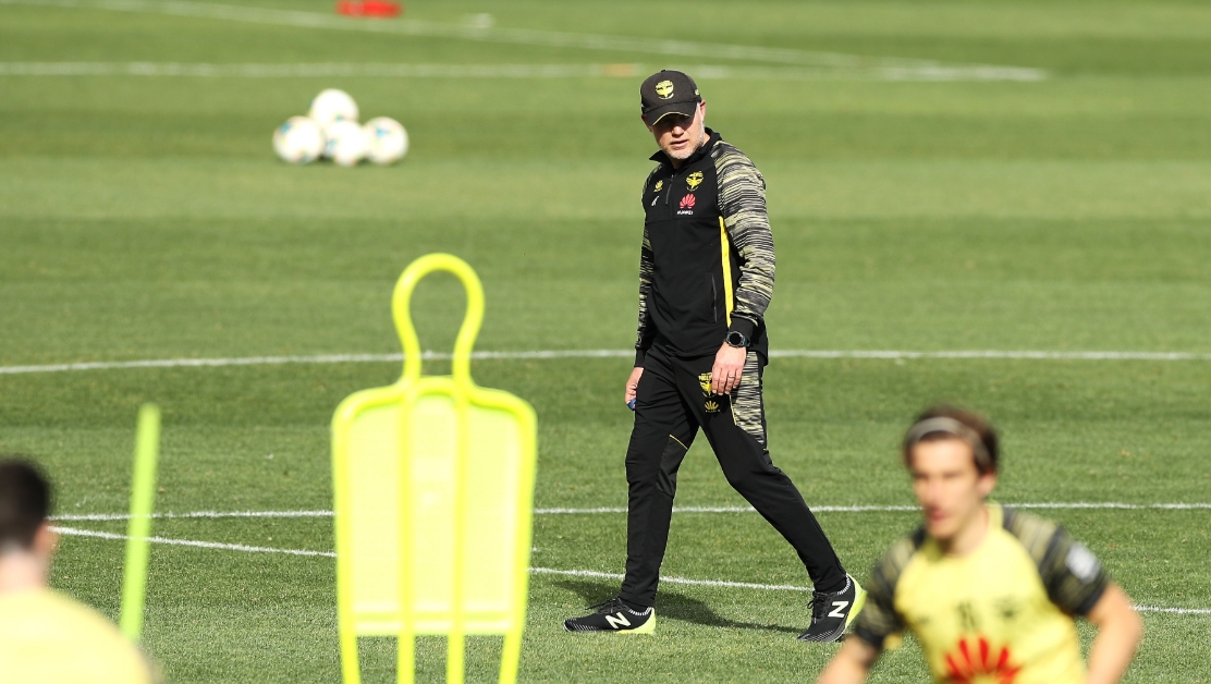 Ufuk Talay watches his side on the training pitch