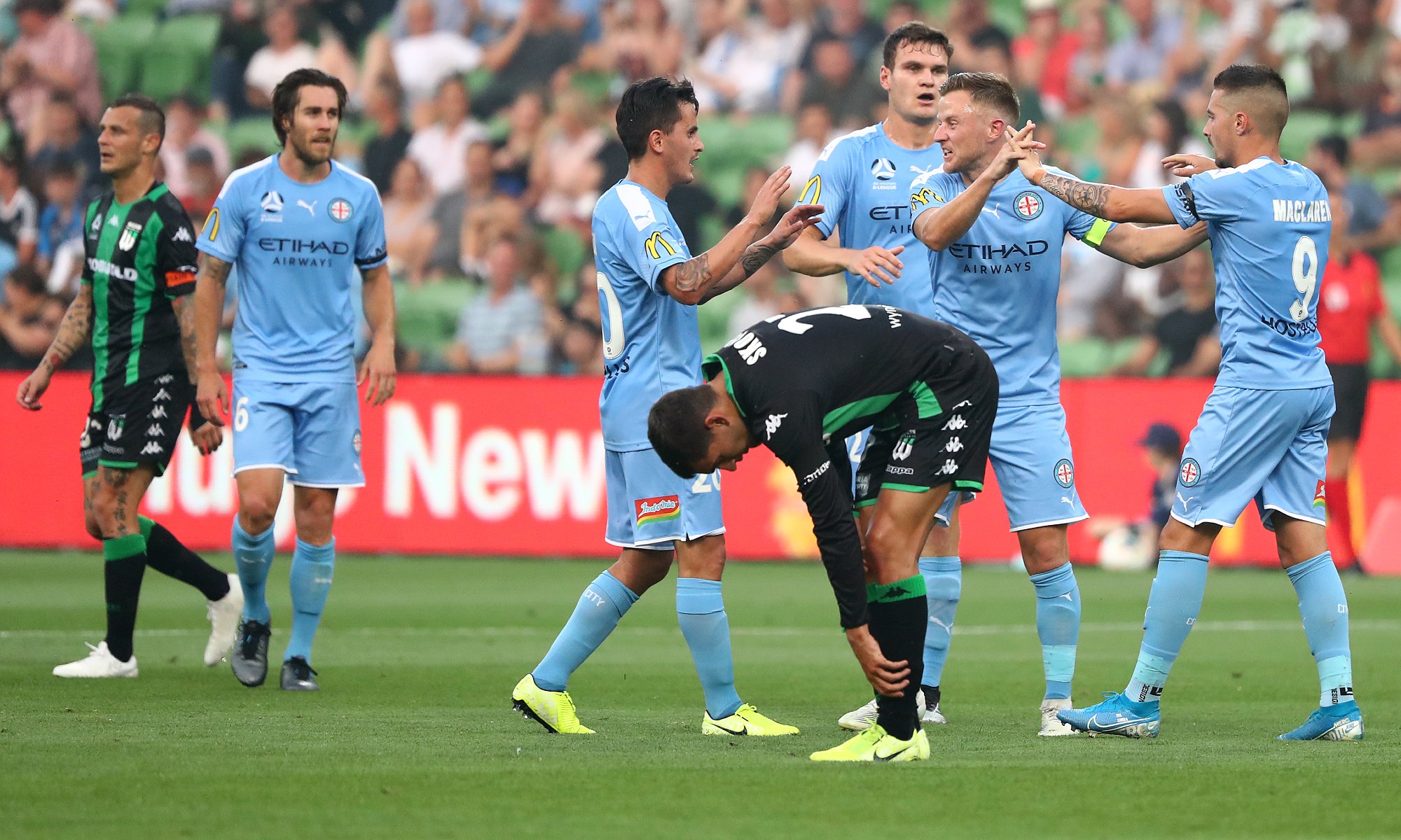 Jamie Maclaren celebrates