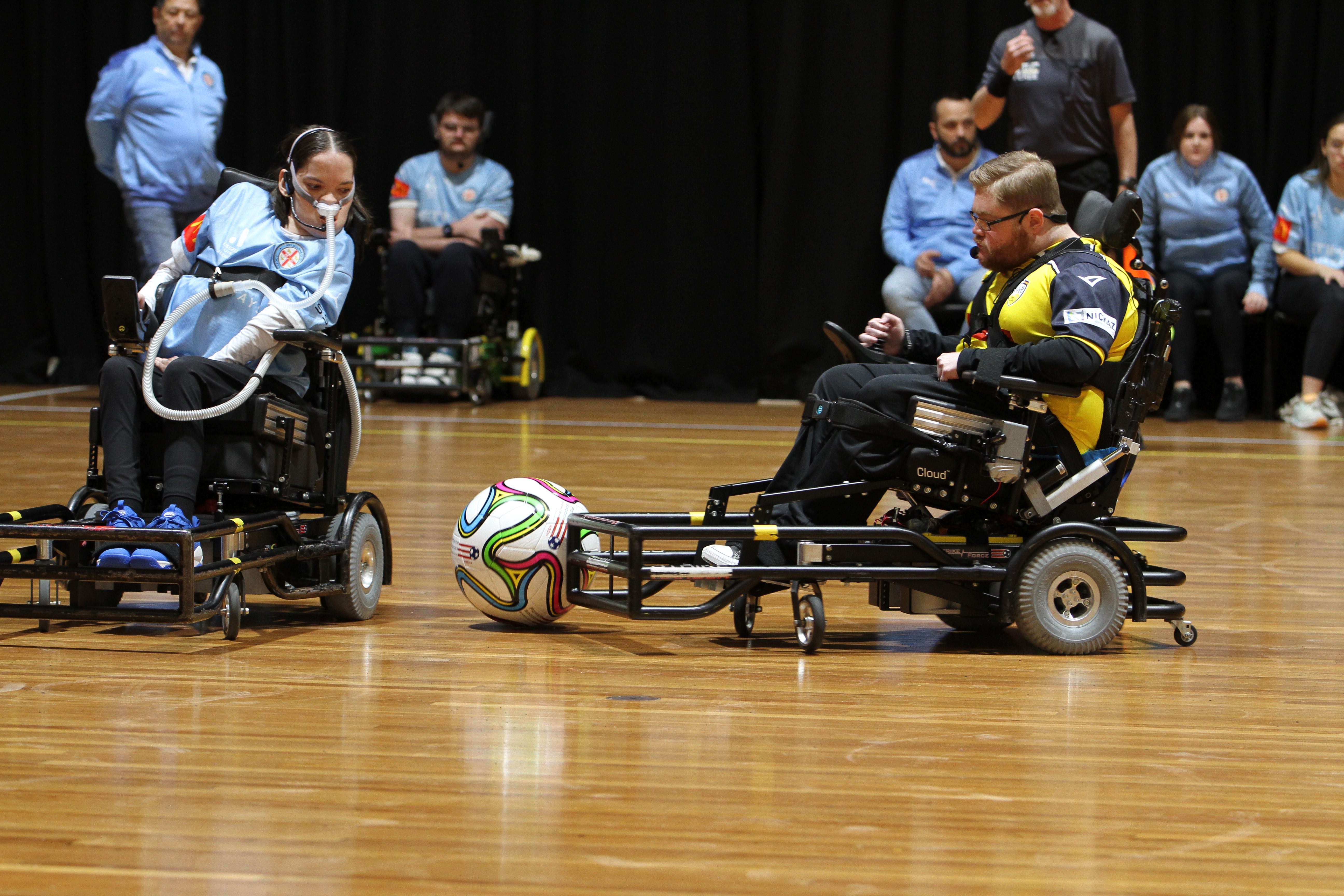Rebecca Evans playing powerchair football