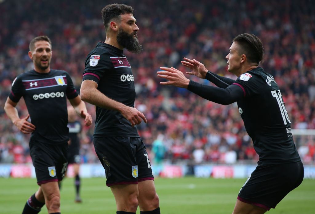 Mile Jedinak celebrates his goal with Jack Grealish