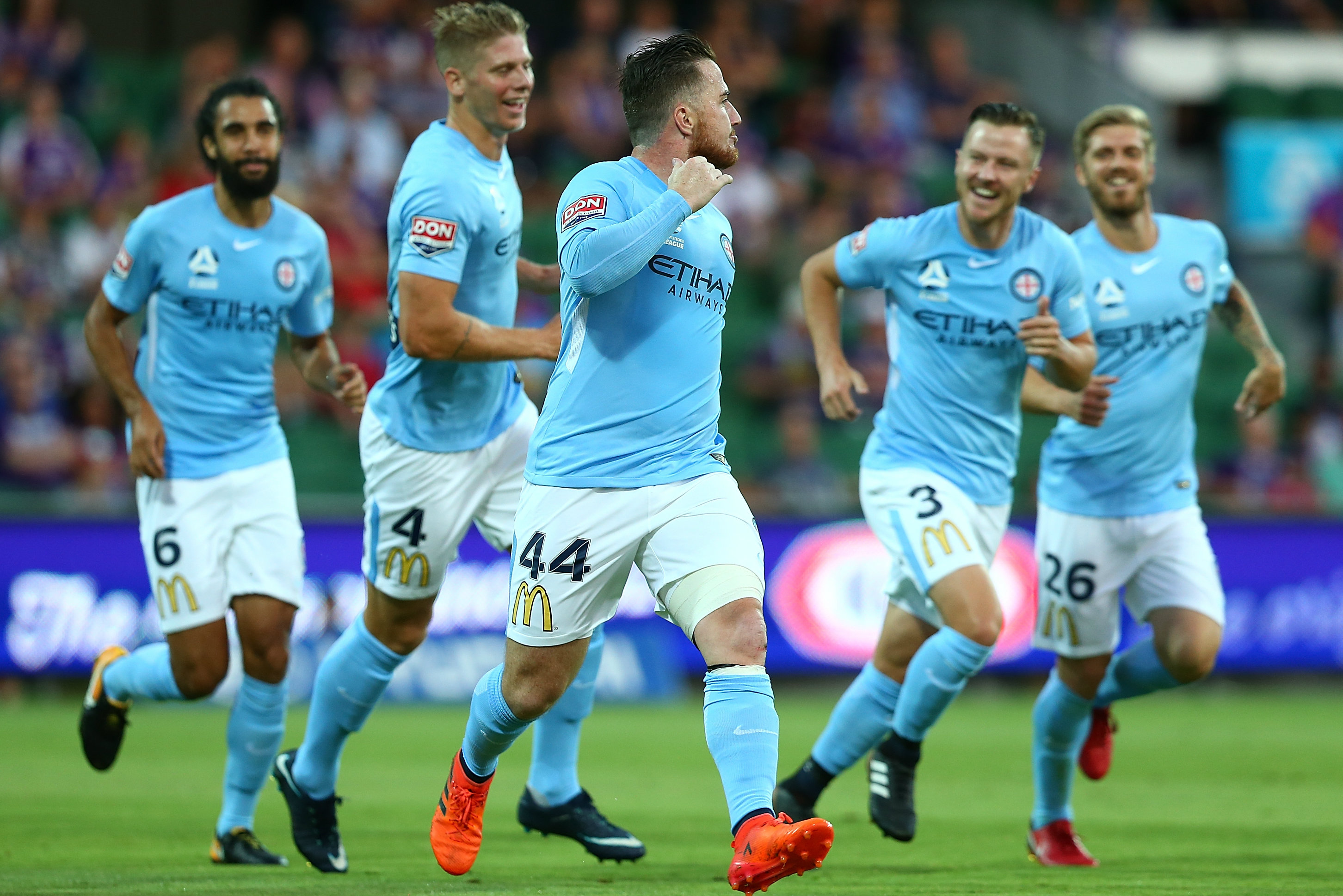 Melbourne City celebrate a goal.