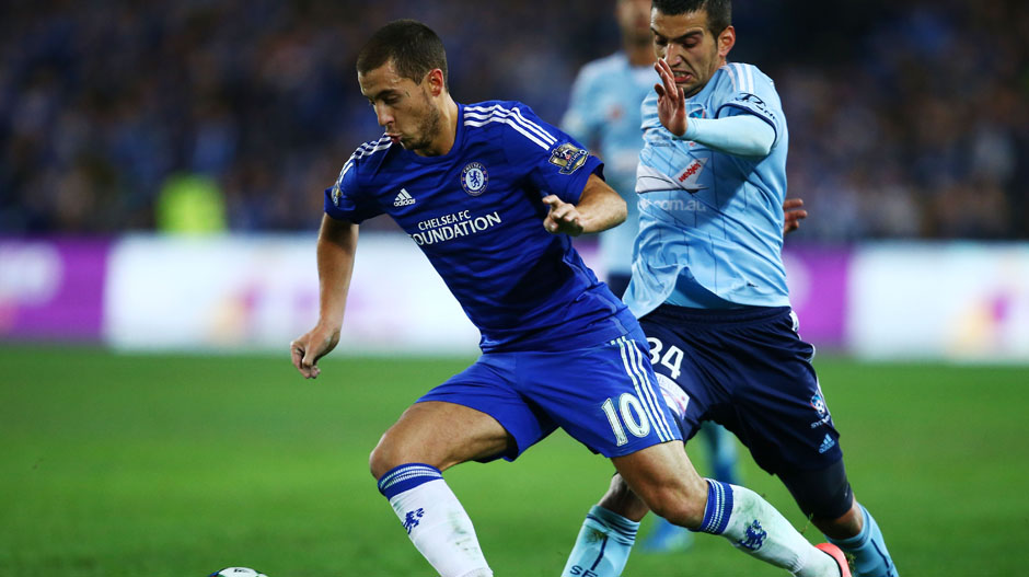 Eden Hazard dribbles the ball past Robert Stambolziev.