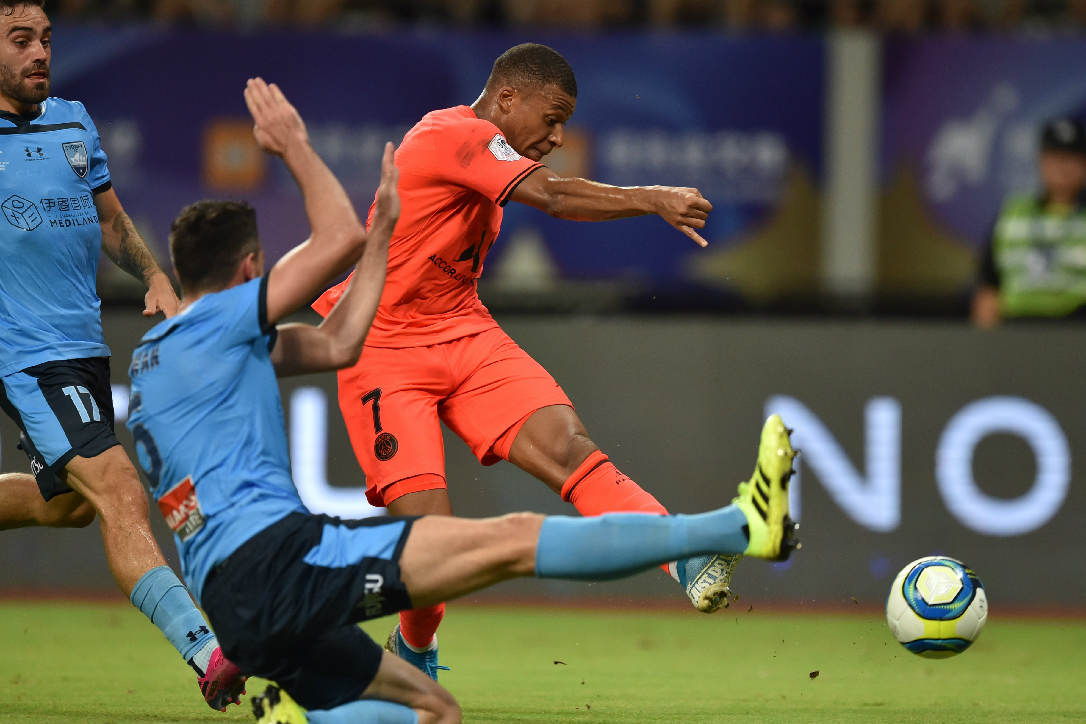 Kylian Mbappe gets a shot away to open the scoring for PSG