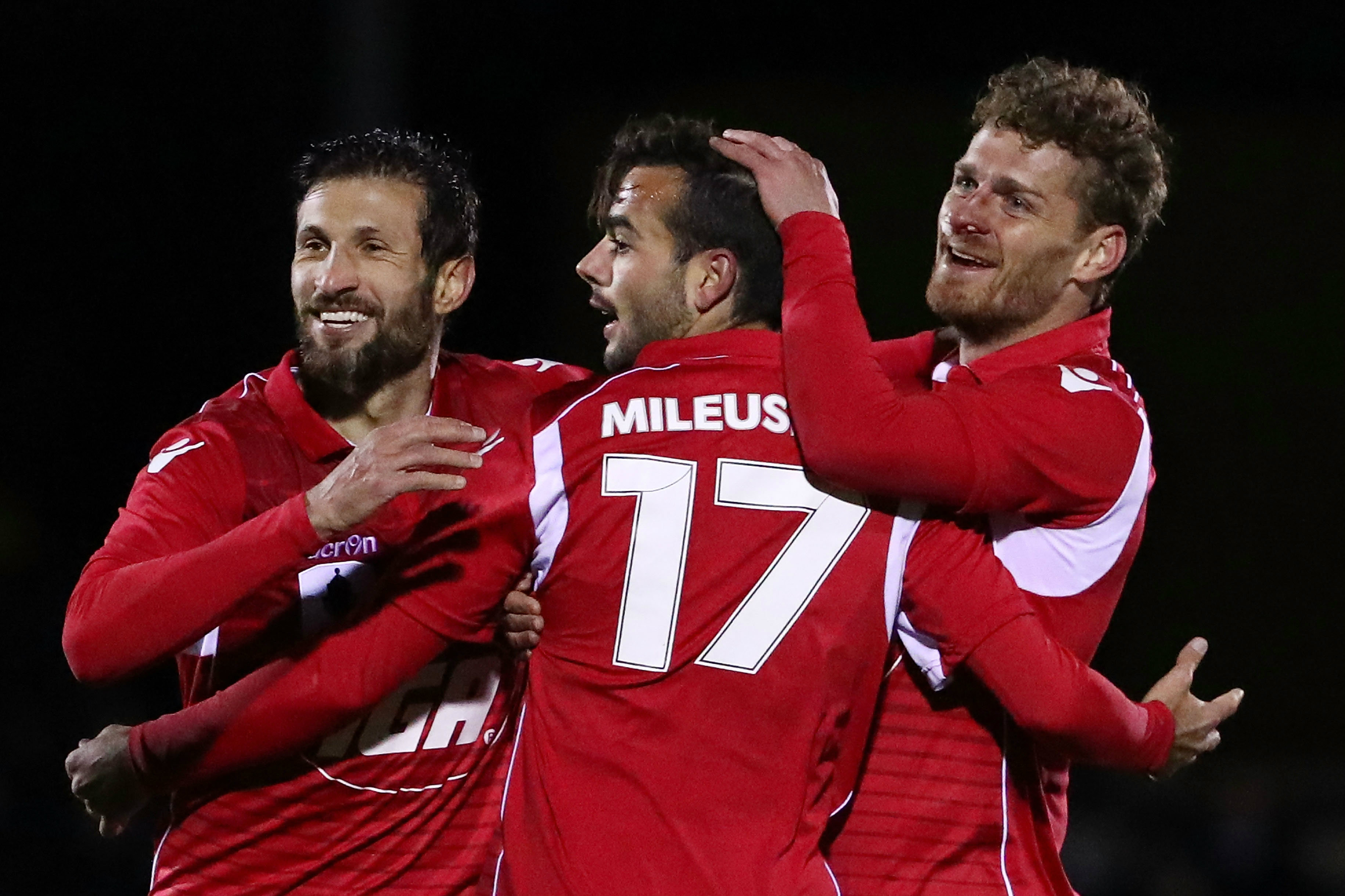 Adelaide United players celebrate a goal during the Westfield FFA Cup.