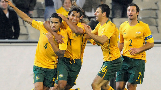 Striker Tim Cahill celebrates scoring against Japan at the MCG in 2009.