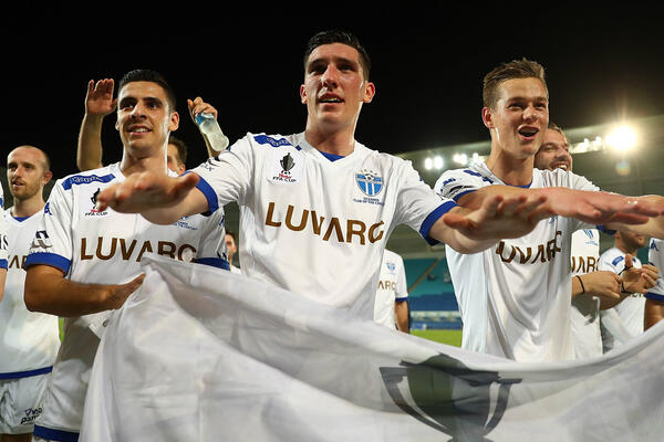South Melbourne players celebrate after their Westfield FFA Cup quarter-final win over Gold Coast City.