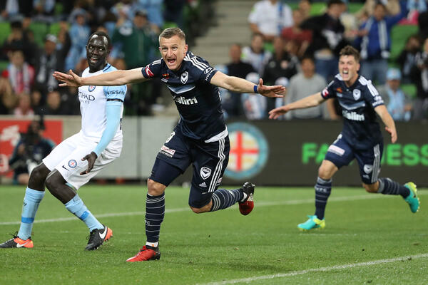 Besart Berisha celebrates a goal in last season's Melbourne Derby.