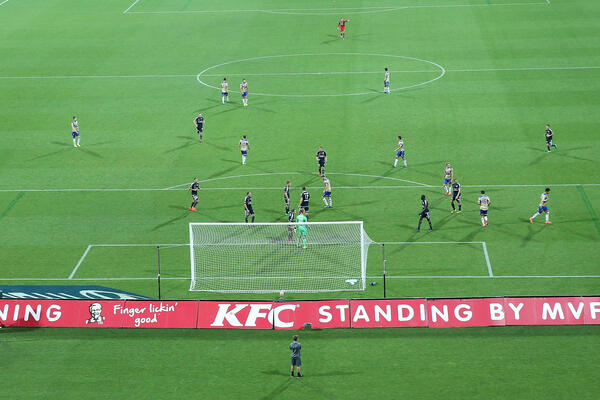 A couple of Hyundai A-League teams set up their formations during a game.