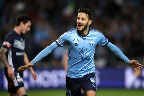 Milos Ninkovic celebrates the sixth and final goal of Sydney FC's rout of Victory