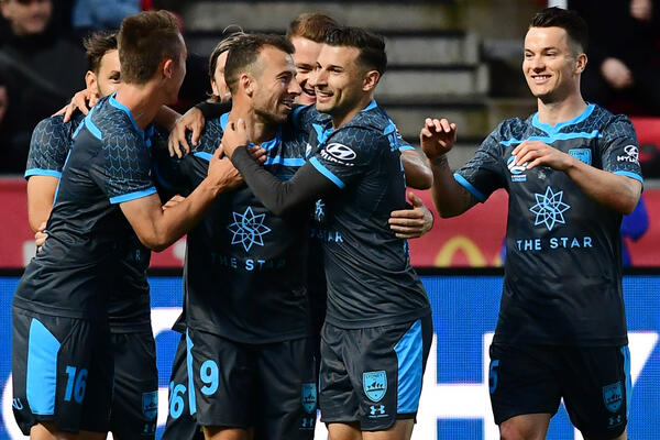 Sydney FC celebrate a goal