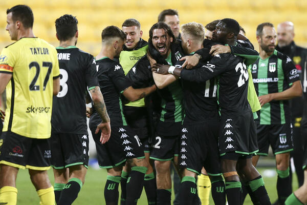 Western United celebrate their win over Wellington Phoenix