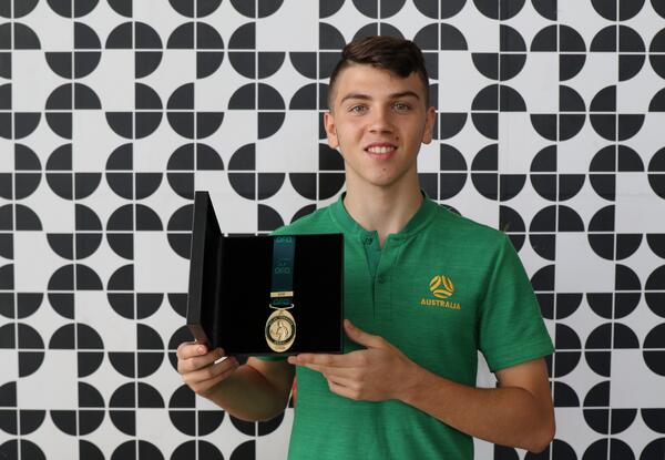 Noah Botic with the Dylan Tombides Medal