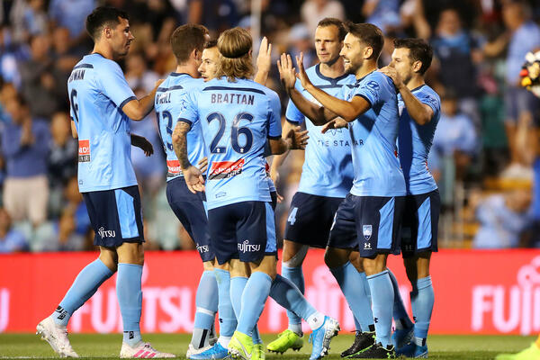 Sydney FC celebrate a goal against Newcastle Jets