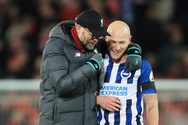 Jurgen Klopp with Aaron Mooy