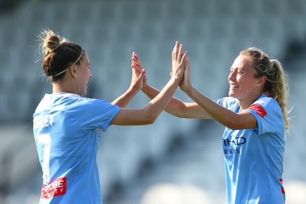 Steph Catley; Claire Emslie