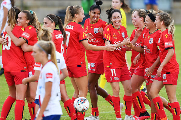 Adelaide United celebrate a goal