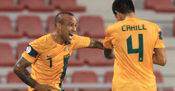 Archie Thompson celebrates Socceroos Cahill