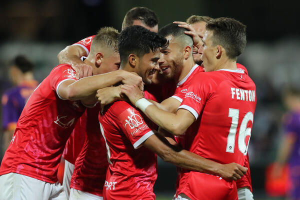 Wellington celebrate a goal
