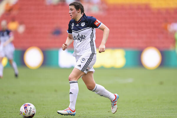 Ayres celebrates a goal against Brisbane