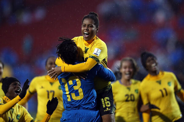 Dominique Bond-Flasza, of Jamaica, celebrates scoring the winning penalty in the shootout against Panama in the 2018 CONCACAF Women's Championship