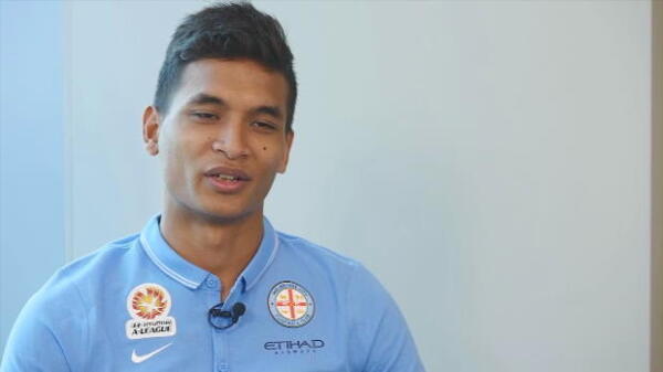 City sign Singaporean international