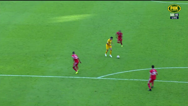 Tom Rogic threatens from distance