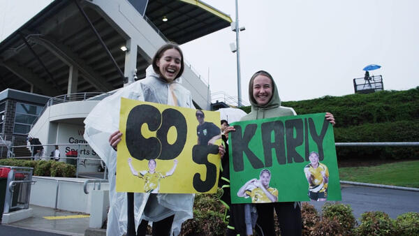 We'd do anything for them: Westfield Matildas fans brave the rain in Campbelltown