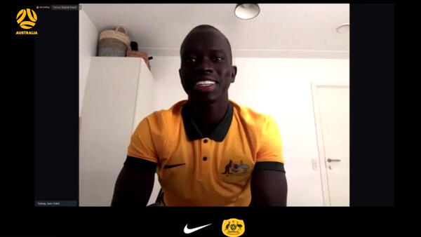 Awer Mabil on green shorts for Nike National Team 