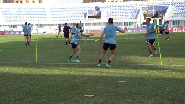 Socceroos play foot tennis in camp