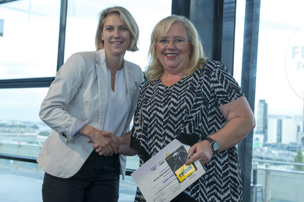 Emma Highwood and rebel Female Football Week Award winner General Manager - Linda Cerone  