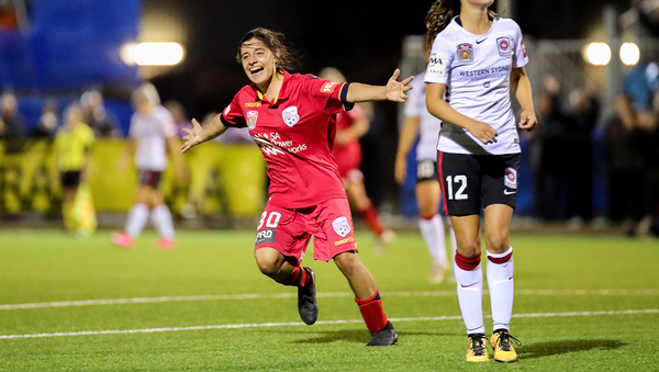 Alex Chidiac celebrates scoring in the Reds 10-2 romp of Western Sydney Wanderers.