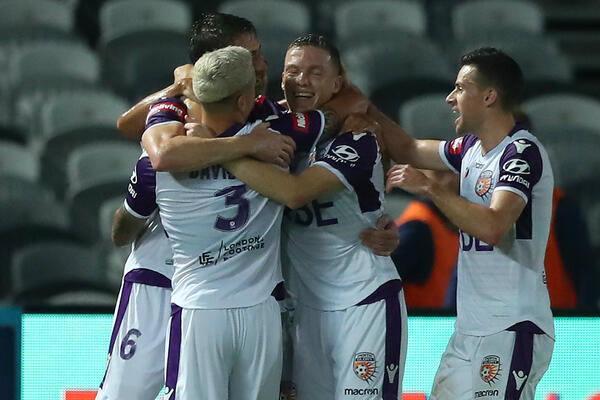 Perth Glory celebrate a goal
