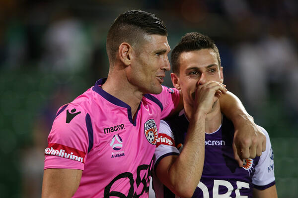 Liam Reddy with Glory attacker Joel Chianese