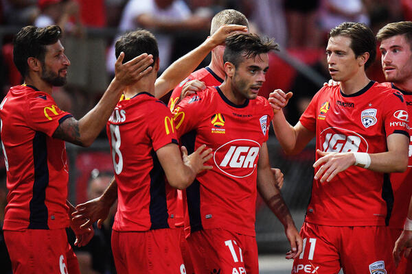Adelaide United celebrate a goal