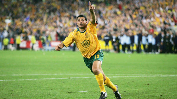 Former Socceroos striker John Aloisi celebrates converting the decisive penalty against Uruguay.
