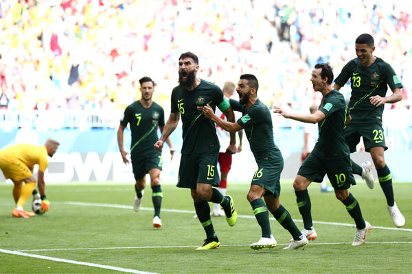 Mile Jedinak scores against Denmark.