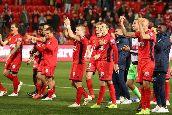Adelaide United players thank the fans