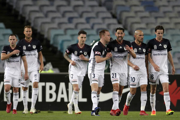 Melbourne Victory celebrate their goal.
