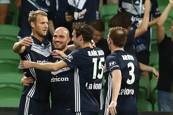 Melbourne Victory celebrate a goal