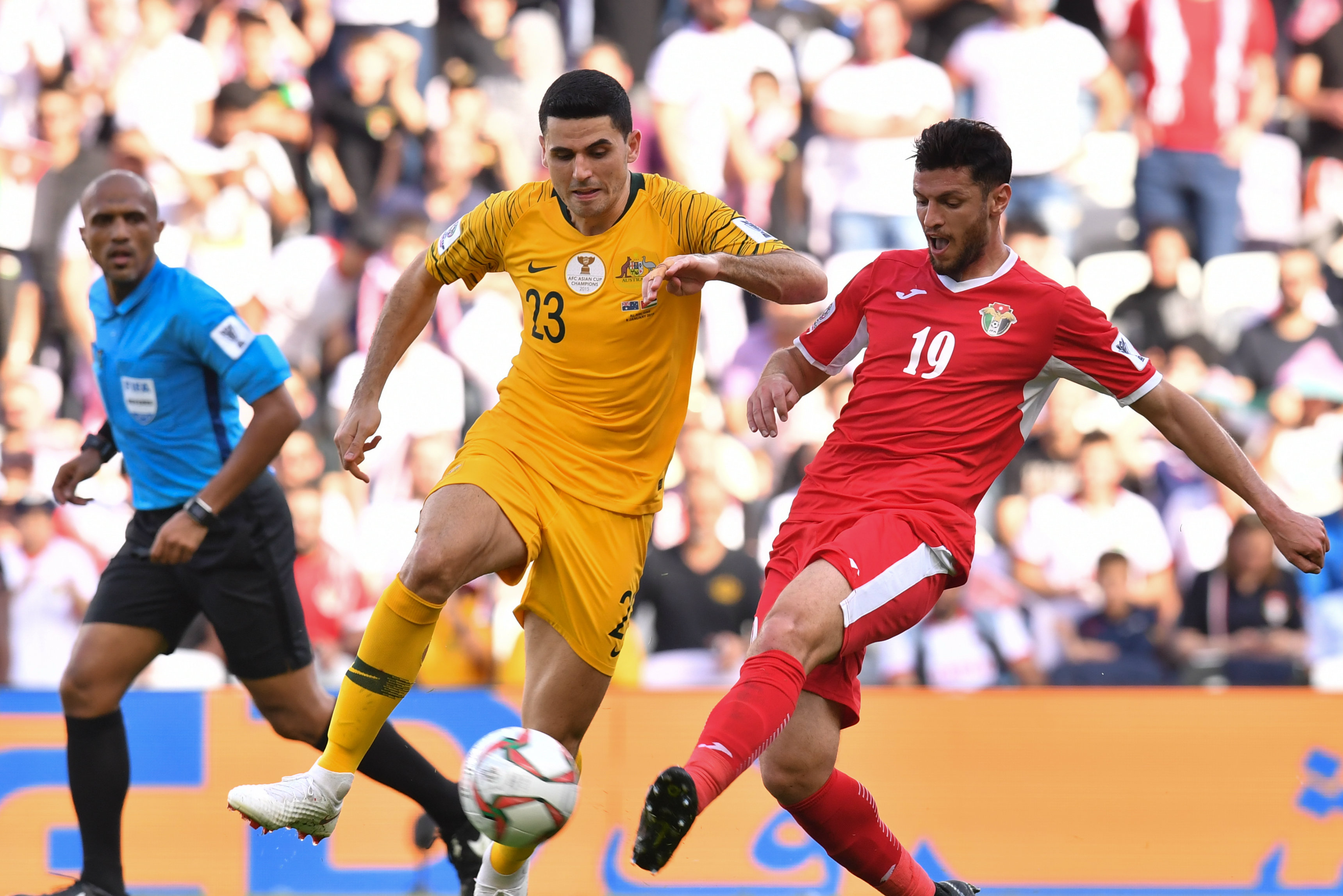 Tom Rogic on the ball against Jordan.
